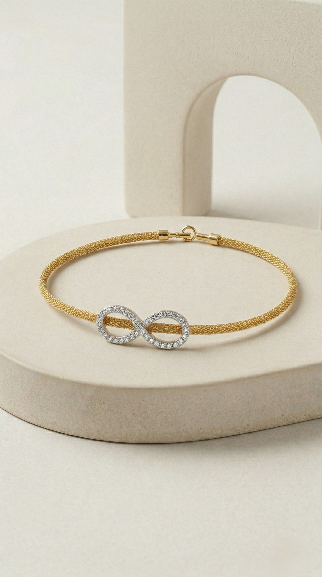 INFINITY MESH CHARM BRACELET