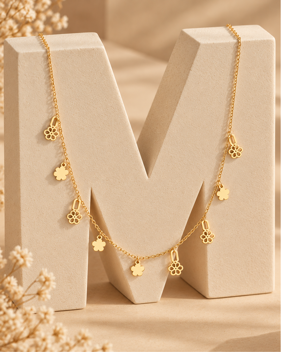 GOLD MULTI-CHARM FLORAL STATION CHAIN NECKLACE