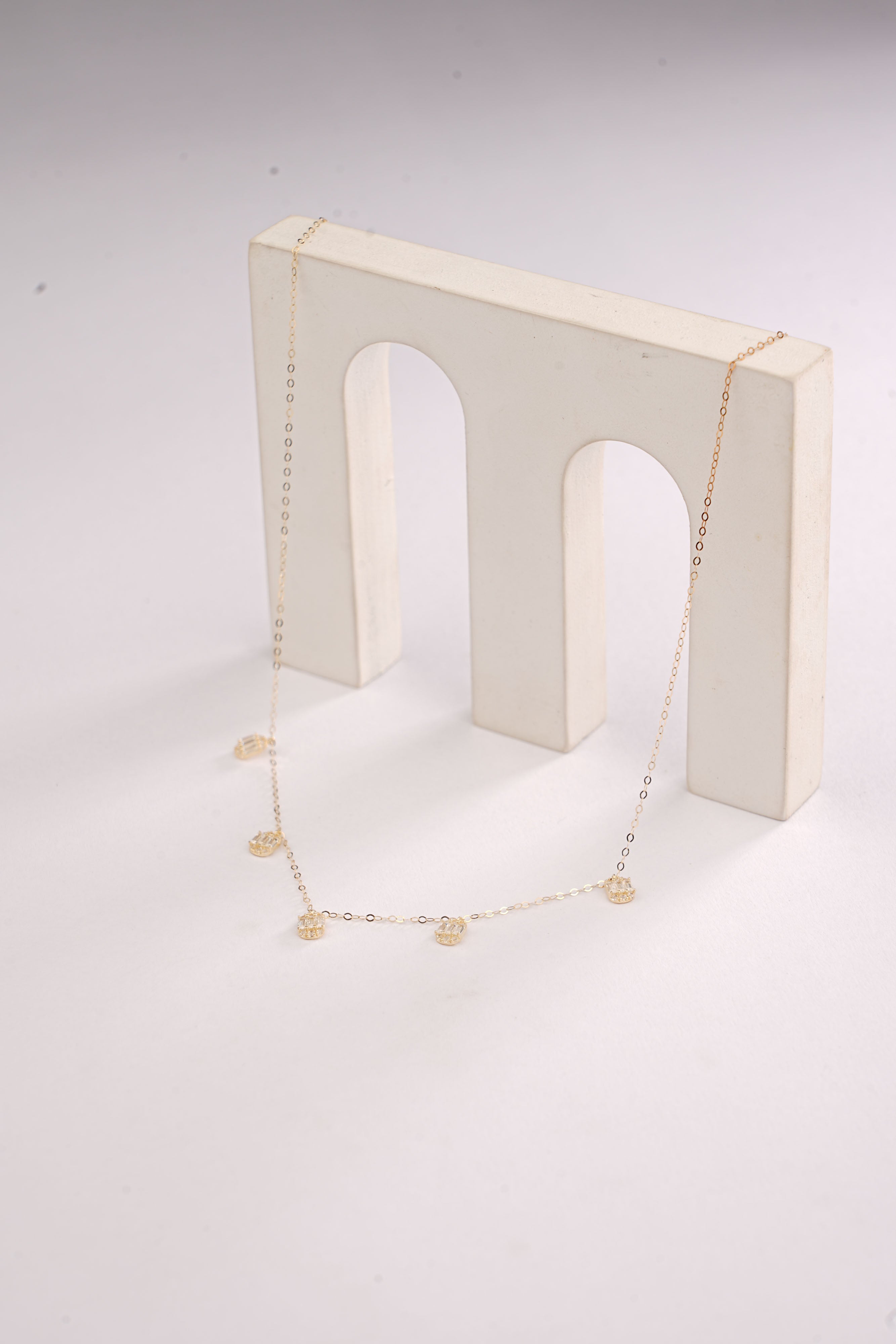 MULTI BAGUETTE CHARMS NECKLACE