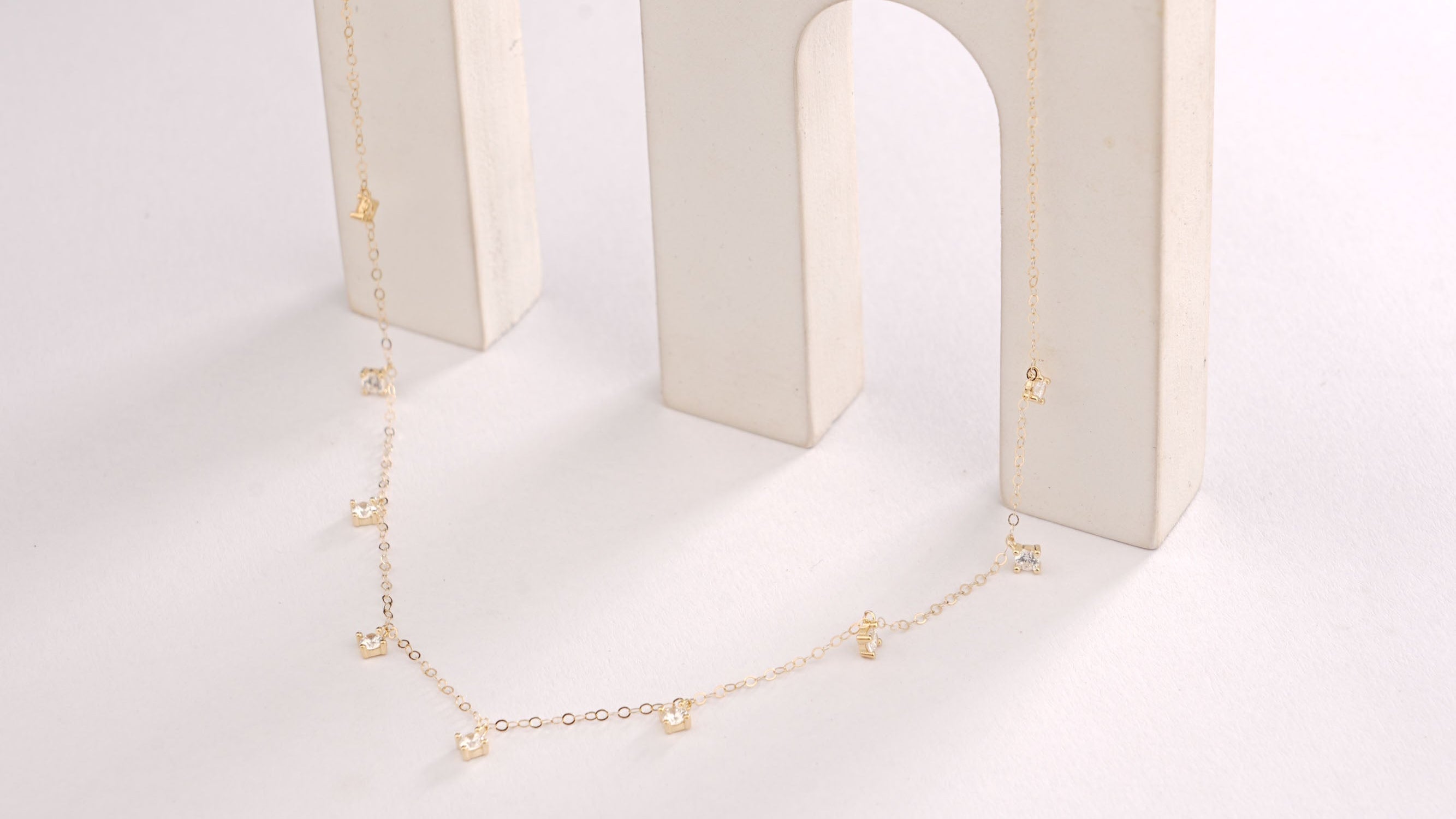 DIAMOND DROP CHARMS NECKLACE