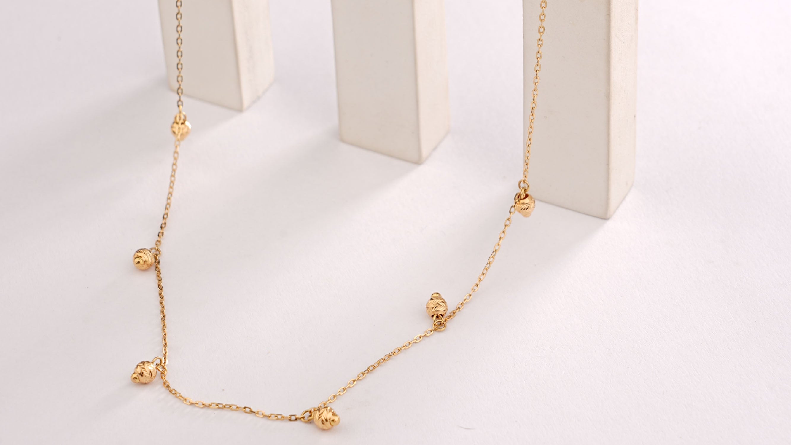 BALL DROP CHARM NECKLACE